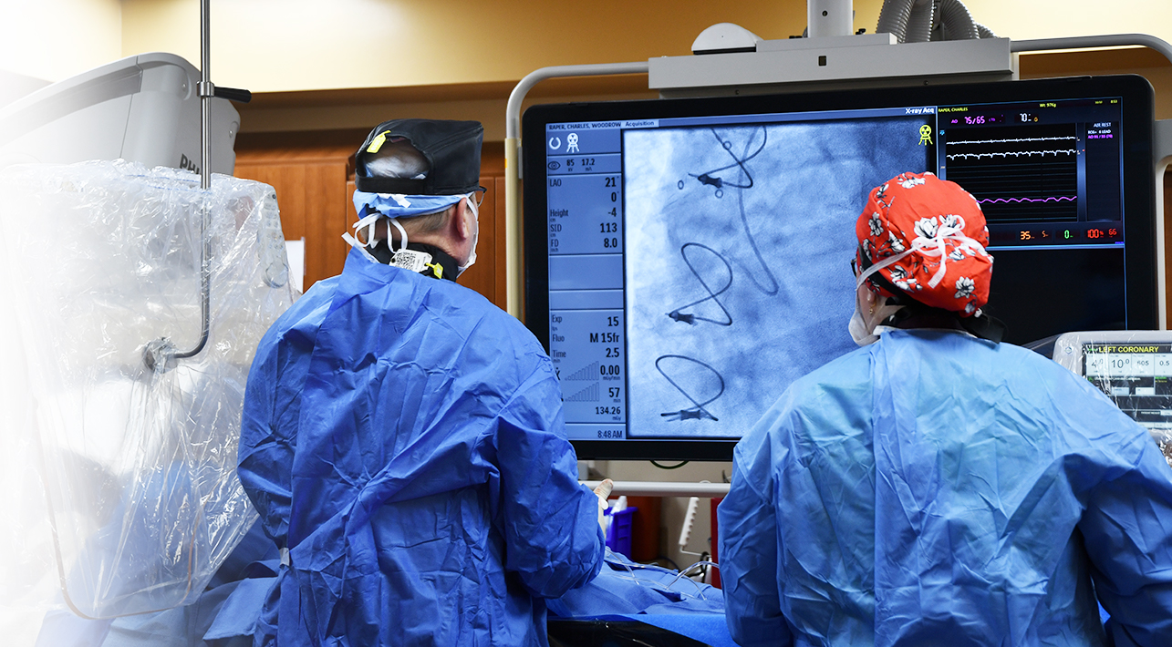 doctors looking at a screen